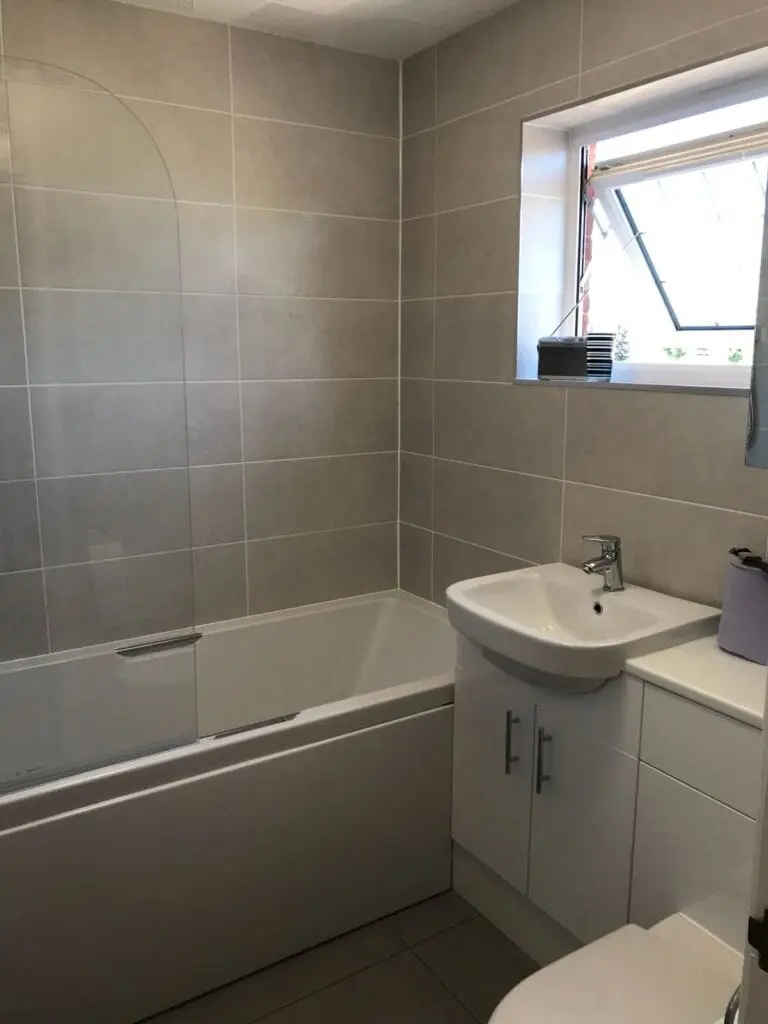 new bathroom fitted, rounded shower glass