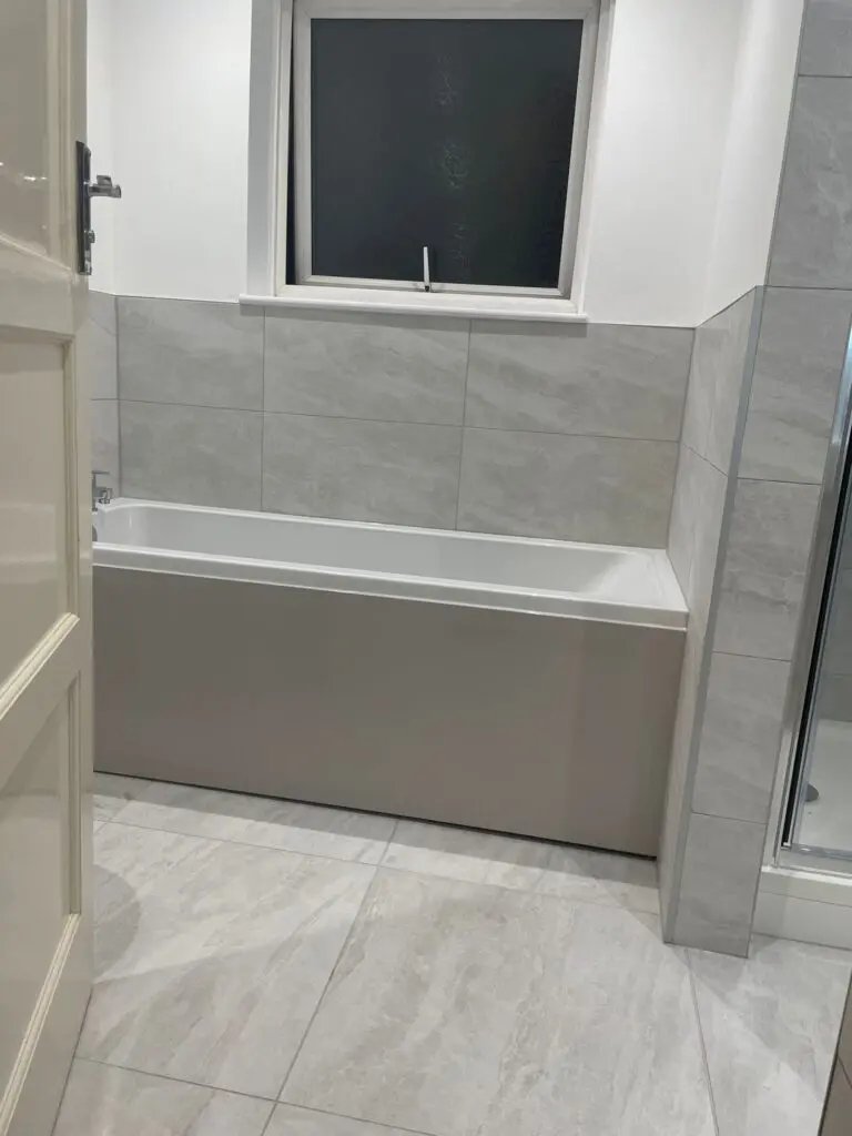 Grey Tiles with chrome tile trim