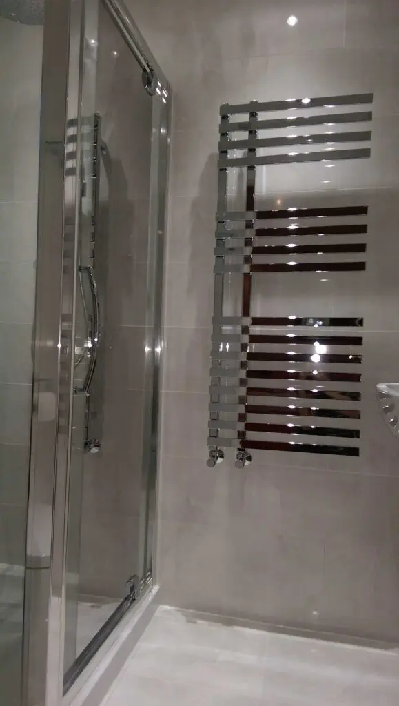 Designer chrome towel rail