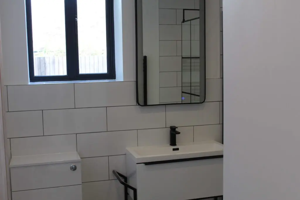 Bathroom Units in White Gloss and black tap