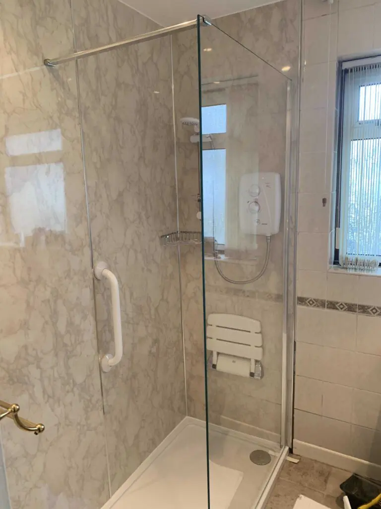 Walk in shower with wet wall panels