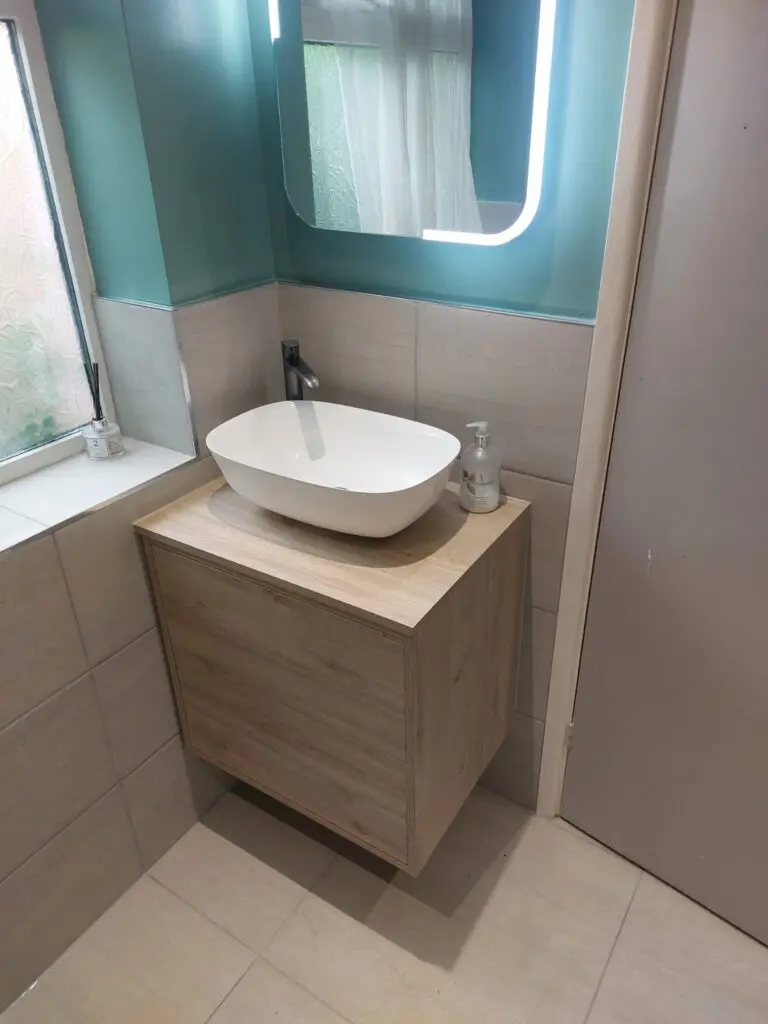 Wall hung basin unit with a bowl and led mirror