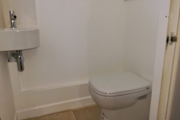 Toilet and Corner Sink Installed