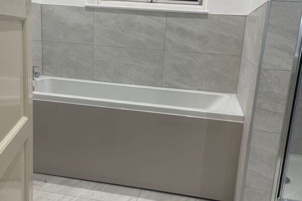 Grey Tiles with chrome tile trim