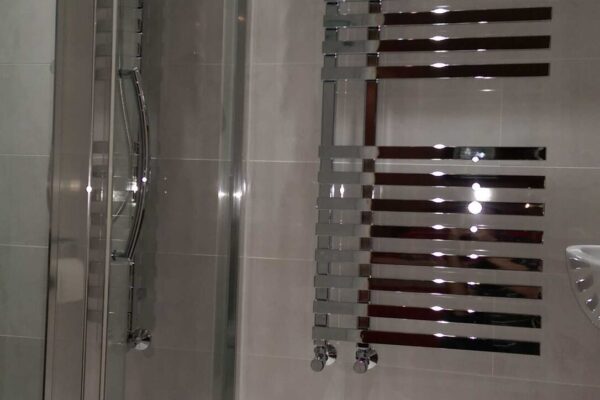 Designer chrome towel rail