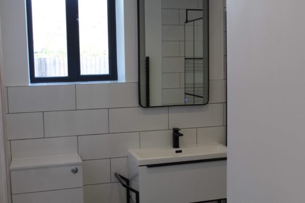 Bathroom Units in White Gloss and black tap