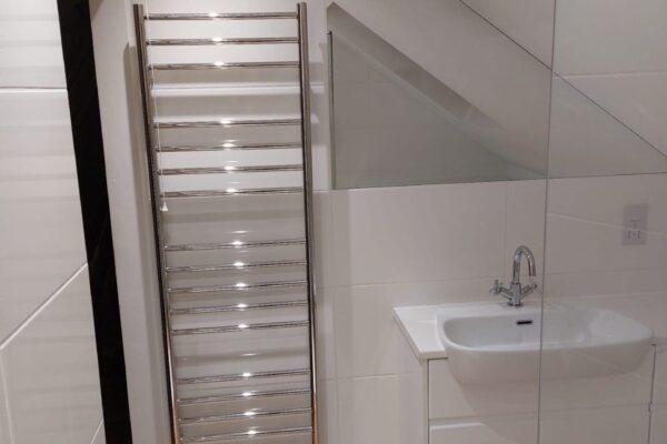 Loft shower room with Bathroom furniture