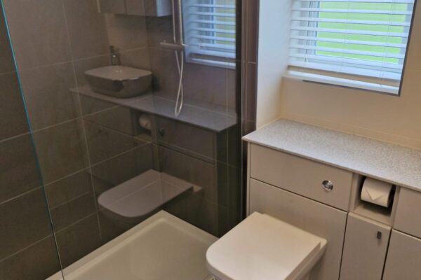 Walk in shower room with Atlanta furniture