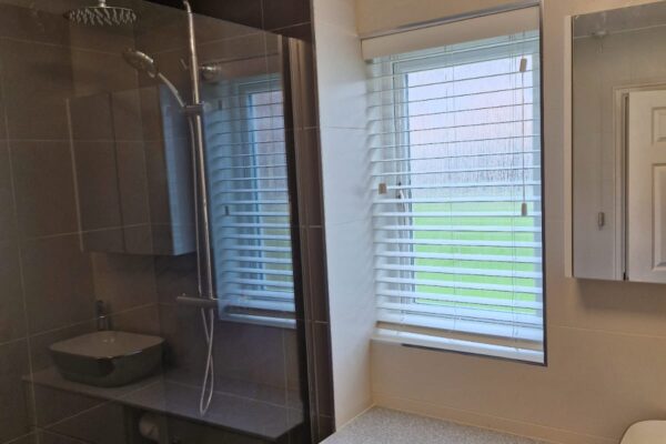 Walk in shower room with Atlanta furniture